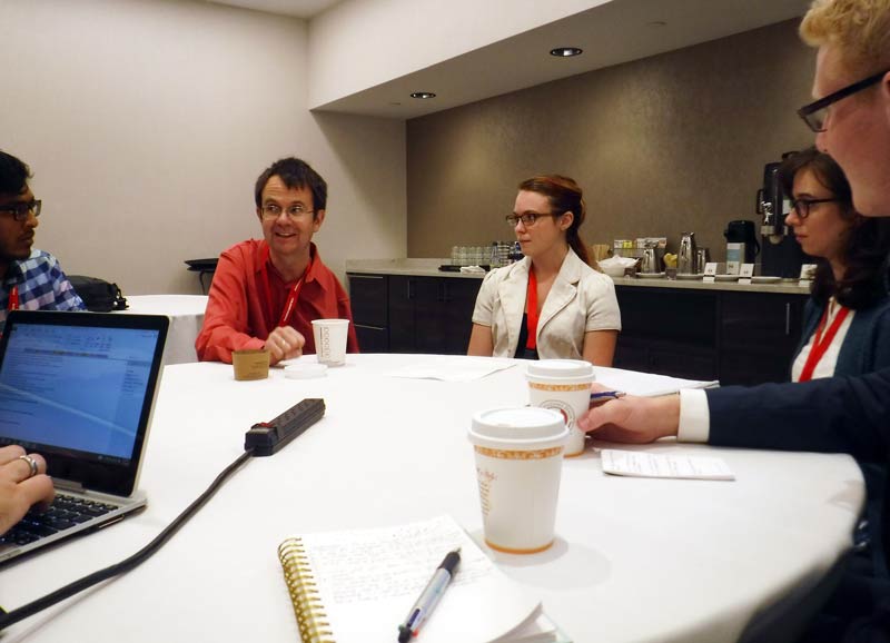 Grove City College student reporters and Zone 11 AZC Lisa McDonald interview Eric Cornell prior to his talk.