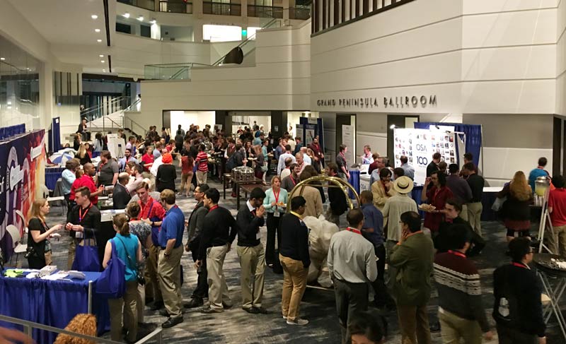 PhysCon attendees networking in the Grand Peninsula Ballroom Lobby.