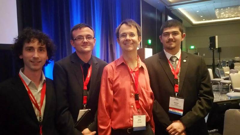 University of West Florida students, Spencer Leper, Andrew Truman, and David Smith, posing with Nobel Laureate, Dr. Eric Cornell. (Photo Credit: Spencer Leper)