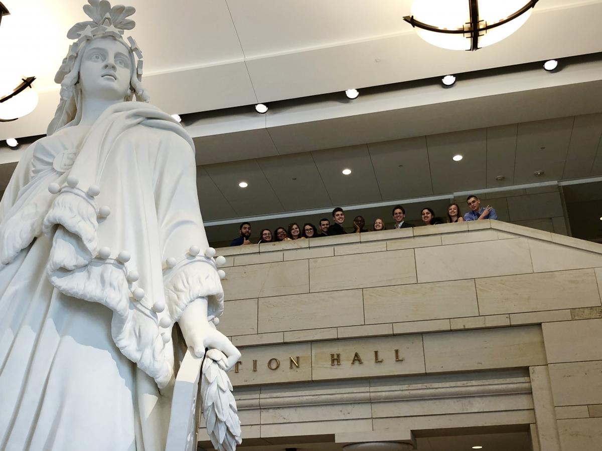 SPS Interns overlooking the Statue of Freedom plaster mold, which represents the identical copper statue at the top of the Capitol Building Dome