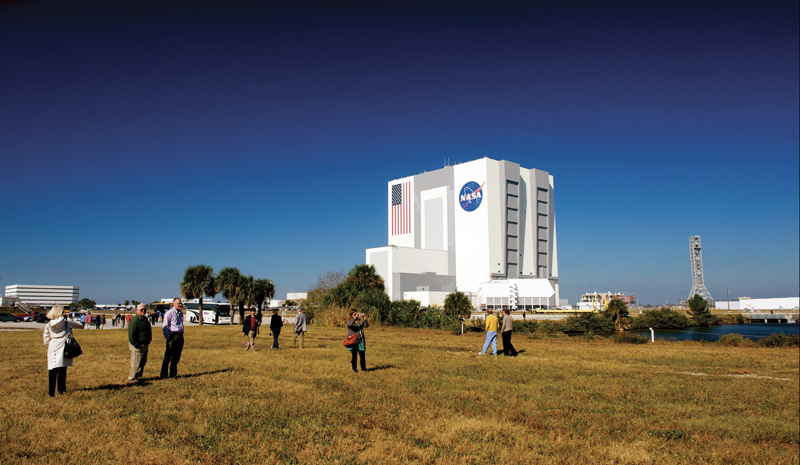  Past Sigma Pi Sigma President George Miner, University of Dayton '78  (second from left) and David Dunlap, University of Maine '78 (third from left) are pictured along with students, alumni, and PhysCon guests as they tour NASA Kennedy Space Center on Thursday, November 8, 2012. Photo by Michael Duncan.