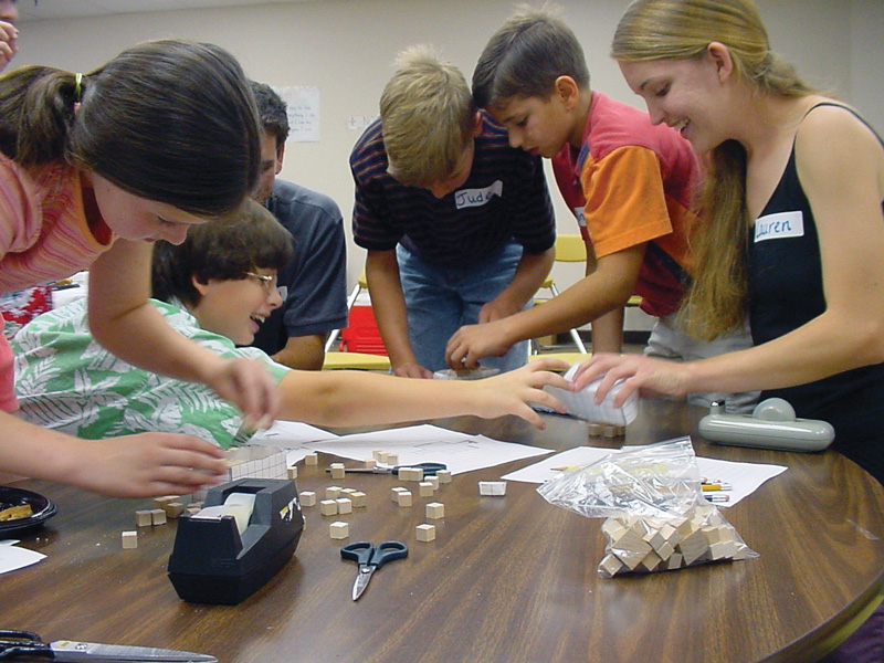 Lauren Zarandona (right) with students from Angelus Academy during her 2002 internship with the Society of Physics Students. Photo by Liz Dart Caron