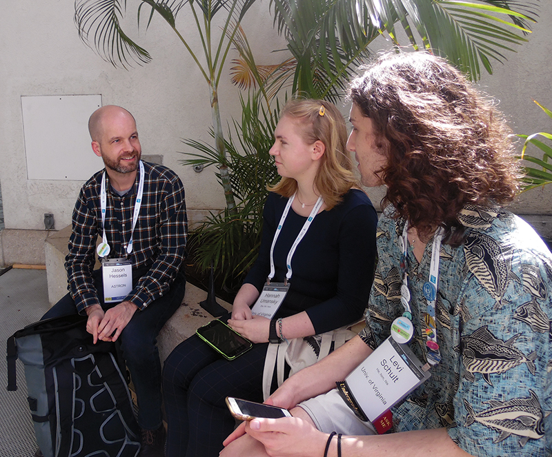 Hannah Umansky and Levi Schult (far right) interview researcher Jason Hessels of the Netherlands Institute for Radio Astronomy. Photo by Morgan Waddy.