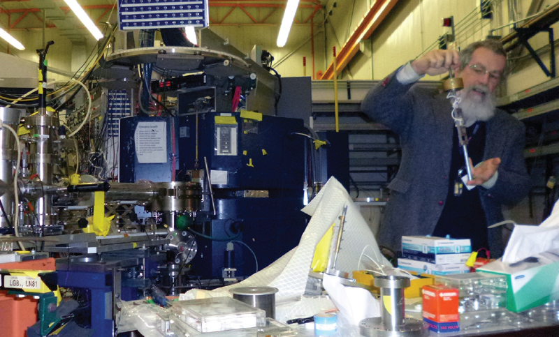 Dan West explains a detector component used for ATLAS, a nuclear physics accelerator that was highlighted on the Argonne tour. Photo by Kevin McDermott.