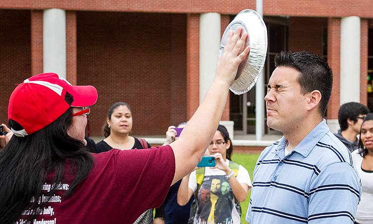 Band director Steve Knight braces for impact. Photo courtesy of the HSU SPS chapter.