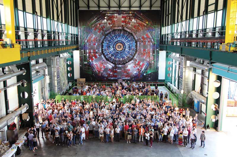 The CMS Collaboration gathers for a group shot. Photo by CERN / CMS Collaboration.