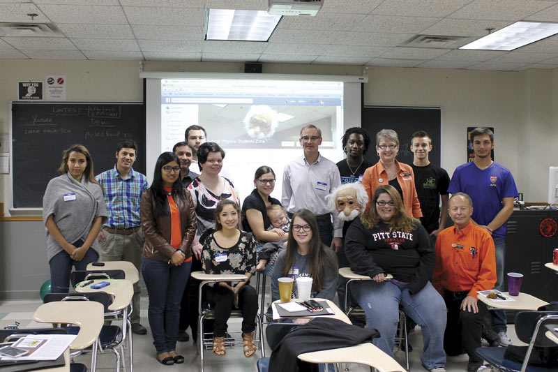 Attendees at the zone 12 meeting gather for a group photo. 