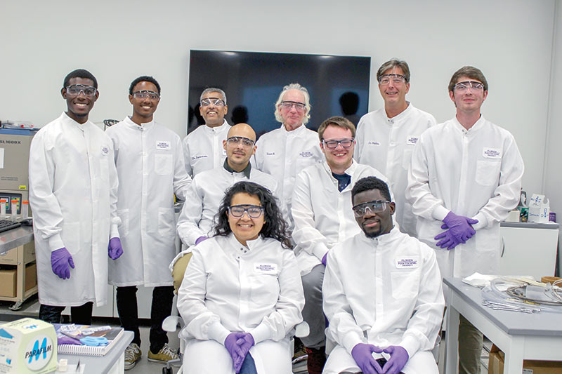 Florida Polytechnic University Research Team. Front Row - Shirley Garcia, Mc Ben Joe Charles; Middle Row - Ecieno Carmona, Dominic Dodson; Back Row -  Michael Nelson, Jared Nurse, SPS FL Poly chapter faculty advisor Dr. Sesha Srinivasan, Mr. Scott Reinhart, Dr. Scott Wallen, and SPS FL Poly chapter secretary Wyatt Liptak. Photo courtesy of Dr. Sesha Srinivasan.