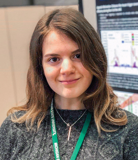 Alexis Mulski with her research poster about the work she did at CERN. Photo courtesy of Alexis Mulski.