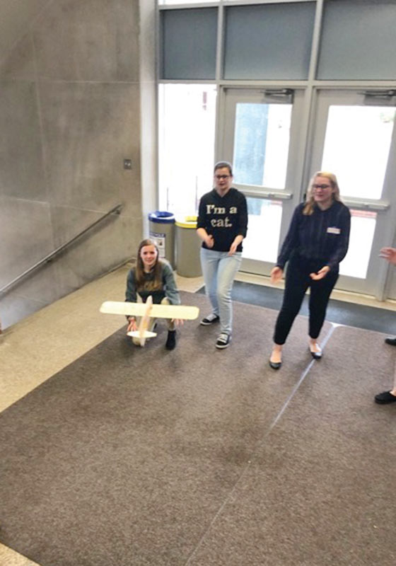 One of the homemade airplanes goes the distance during the Zone 11 competition. Photo by Michael Thompson.