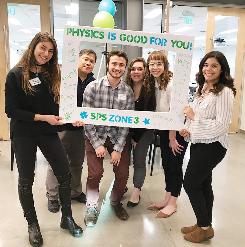 Ramos (second from left) poses with SPS officers and members from the University of the Sciences during the spring 2018 SPS Zone 3 meeting. Photo courtesy of Brad R. Conrad.