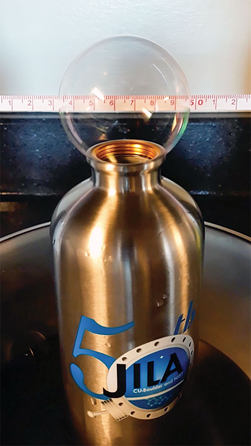 Using household equipment, data can be collected by students at home. For example, a water bottle, some soapy water, a bowl of hot water, a tape measure, and a smartphone camera allow students to make quantitative measurements of thermodynamic quantities at the kitchen table. Photo by M. F. J. Fox.