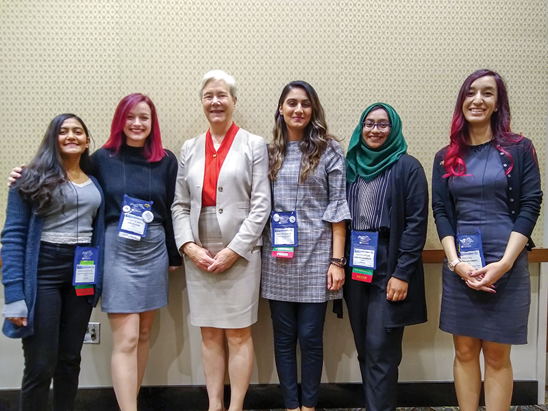 Workshop co-leader and plenary speaker Ellen Williams poses with PhysCon attendees from Adelphi University. Photo credit - Society of Physics Students National Office.