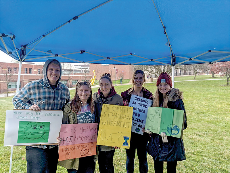  Tyler Fenske (vice president), Emma Evans (webmaster), Lauren Murphy, Caelan Brooks (treasurer), and Emilie Laychock (president). Photo courtesy of the Kutztown SPS chapter.