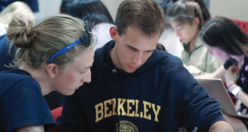 SPS outreach coordinator Charlie Cummings (left) assists a freshman student during 5A Study Hall. Photos courtesy of the University of California, Berkeley’s SPS chapter.