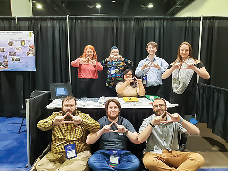  Payton Arber, Calvin Clardy, Sarah Vue (seated), Joseph Schuster, and Becca Voss.