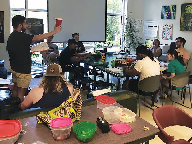 SPS chapter president Roel Olvera presents his small group’s thoughts on the value of a red Solo cup to 2019 workshop attendees. 