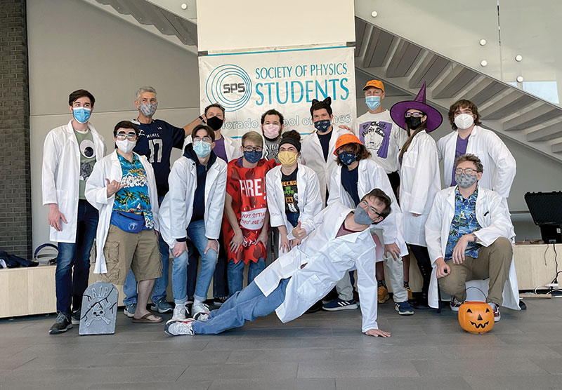 Colorado School of Mines president Paul C. Johnson, a.k.a. PCJ, joins our SPS volunteers for a group picture.