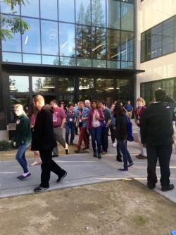 Google X tour attendees outside the facility.