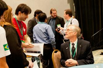 Dr. Mather answers questions from students following his plenary talk. Photo by Ken Cole.