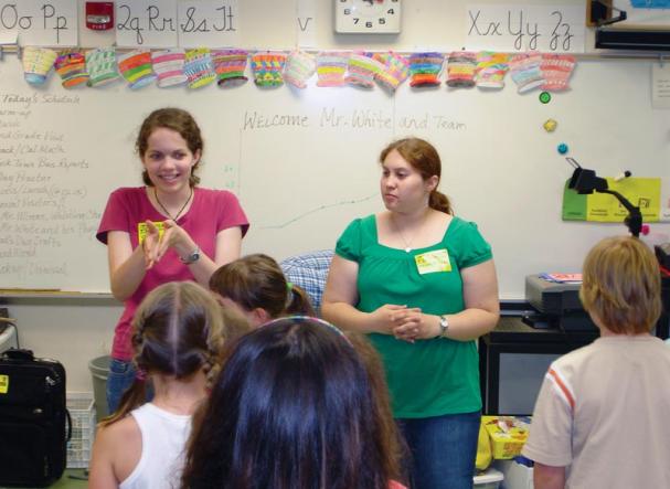 Jenna Smith leads activities from the 2008-09 SPS SOCK (Science Outreach Catalyst Kit), including polarization, sound, reflection, and refraction, during her SPS internship. Photos courtesy of the American Institute of Physics.