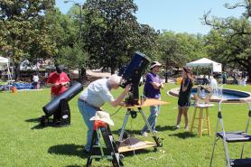 Members of the public  peer through telescopes in an astronomy outreach event put on by the Mobile Astronomy Resource System (MARS) truck. Photos courtesy of Bethany Broekhoven.